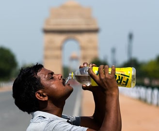 Man drinking water in Delhi, heat wave in Rajasthan
