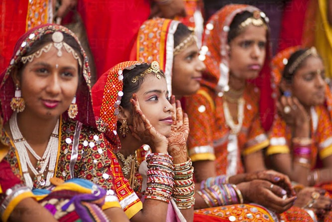 Woman posing in traditional Rajasthani dress, Pushkar, Ajmer, Rajasthan,  India - SuperStock